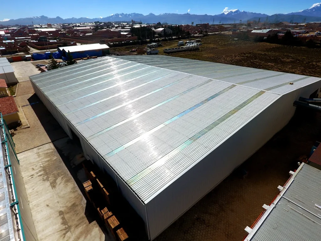 Aerial roof view of the completed 4,320 m² steel structure warehouse building in El Alto, Bolivia