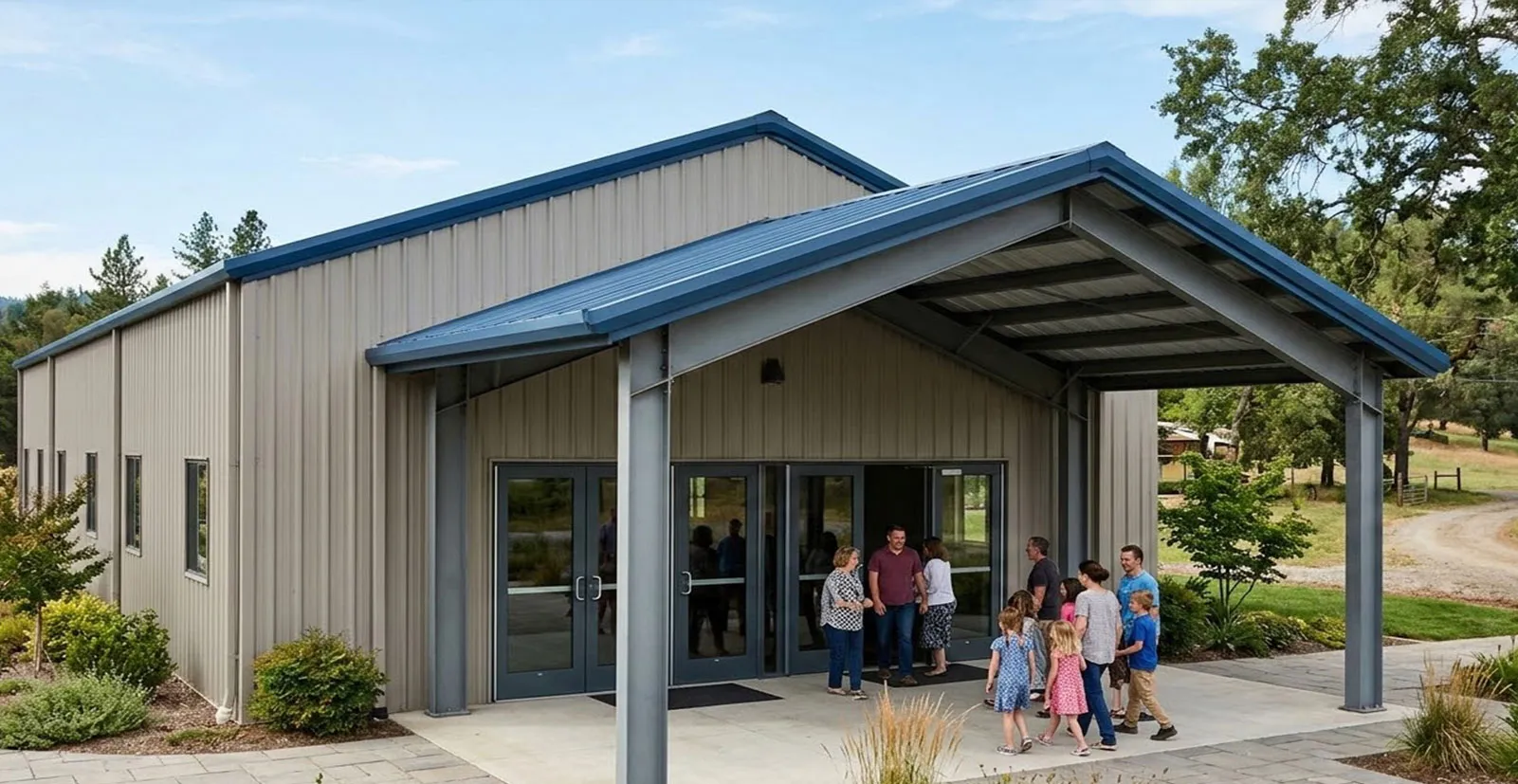 Church building design with blue metal roof, vertical wall panels, covered steel entrance canopy, glass doors, and community access area for worship projects.