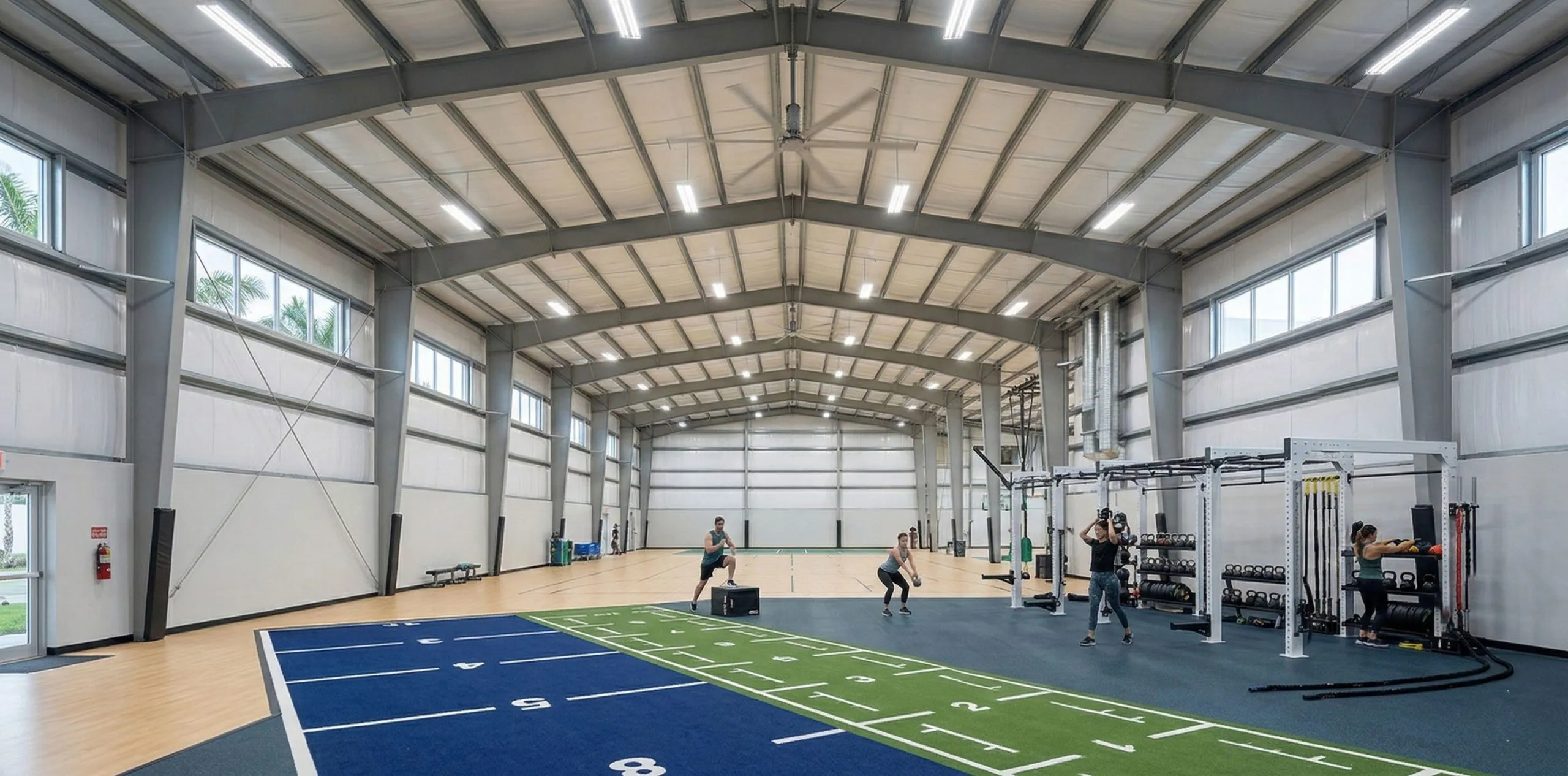 Functional fitness gym design featuring large span interior space, steel structure and training areas.