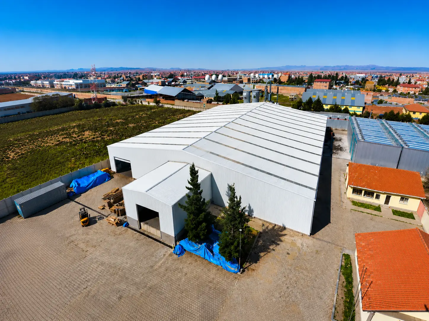 Aerial view of Bolivia steel structure warehouse with metal roof and industrial storage area