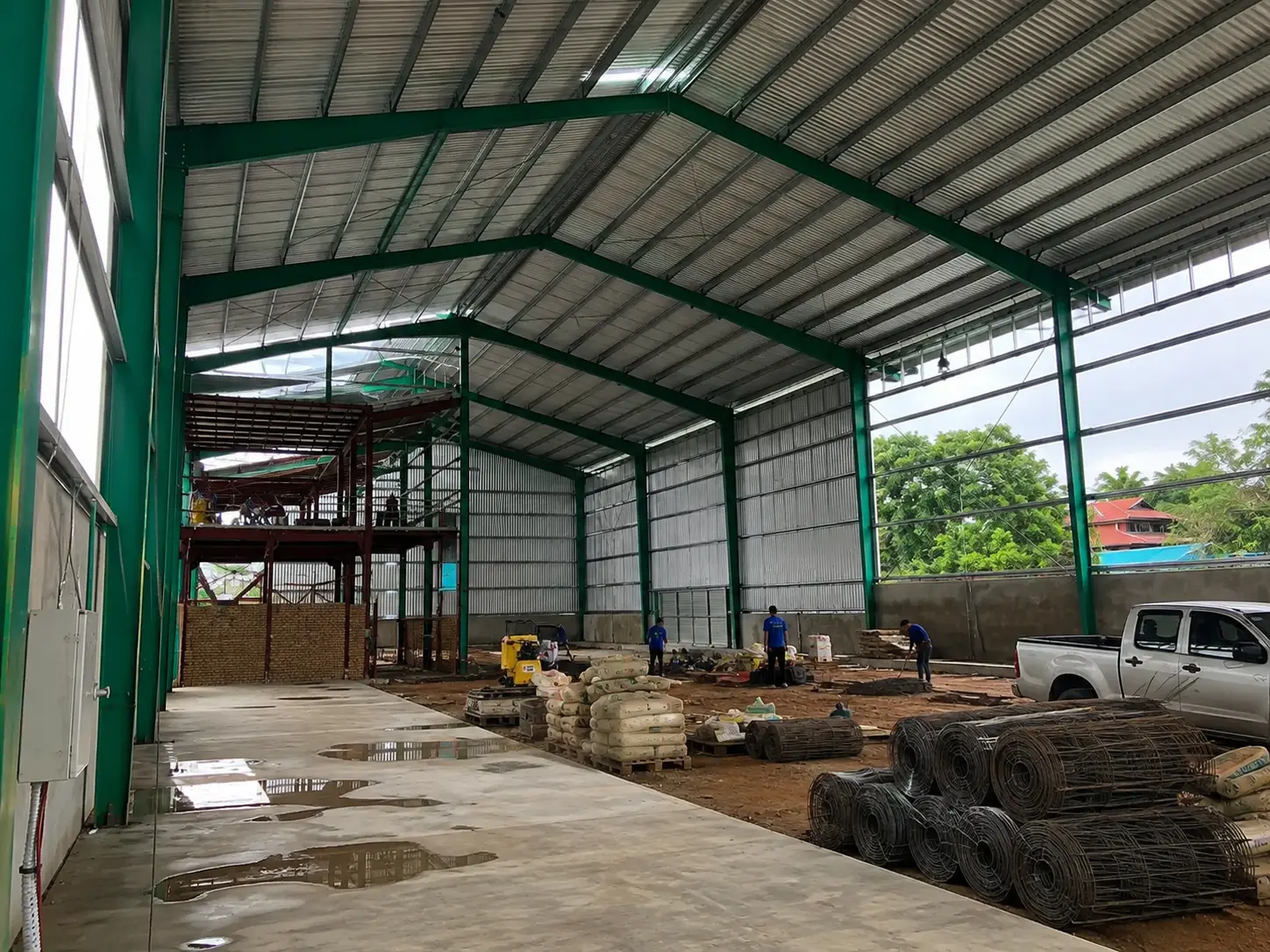 Interior view of Ghana steel structure warehouse with steel frames and ongoing installation work