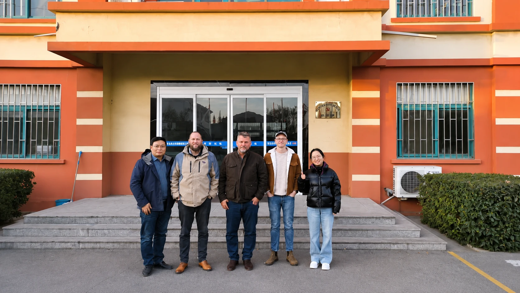 International clients visiting a steel structure manufacturer and meeting the factory team during an on-site business visit.