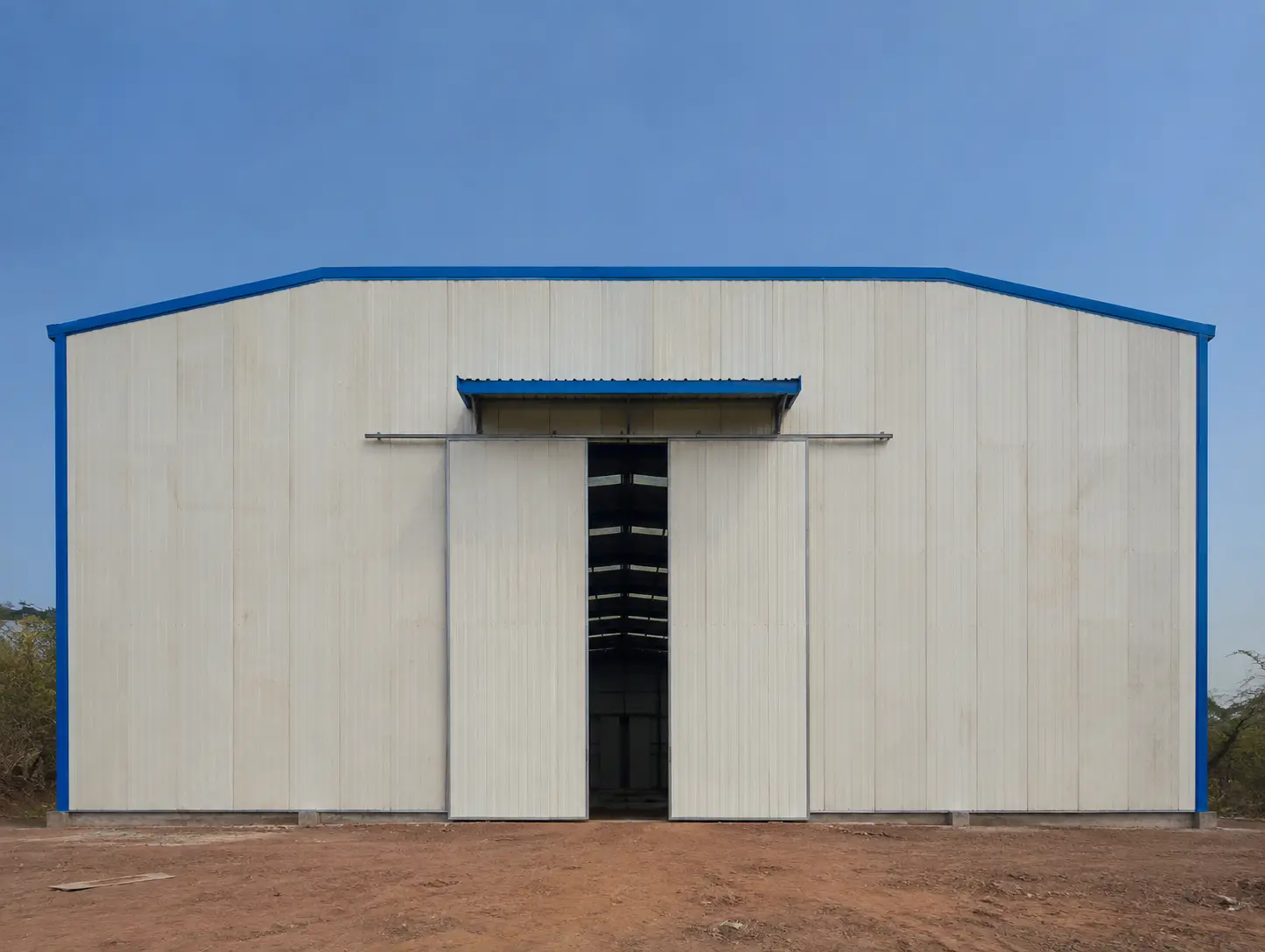 Niger steel warehouse with large sliding door system installed on the front elevation